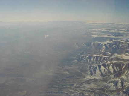 Mountains and desert in Utah<br>Location: <a href="https://www.google.com/maps/search/?api=1&query=39.55736,-110.8969" target="_new">Over Utah</a>